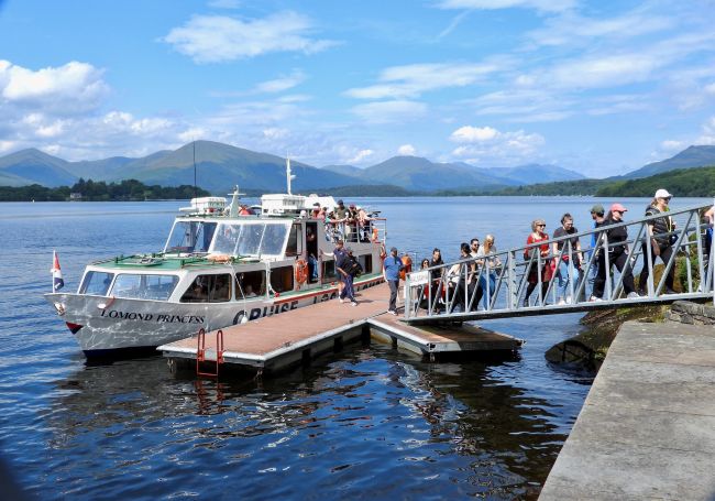 Boat arriving at Balmaha pontoon